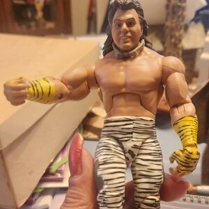 Action Figure with Zebra Pants and Yellow Arm Bands Burtus The Beefcake
